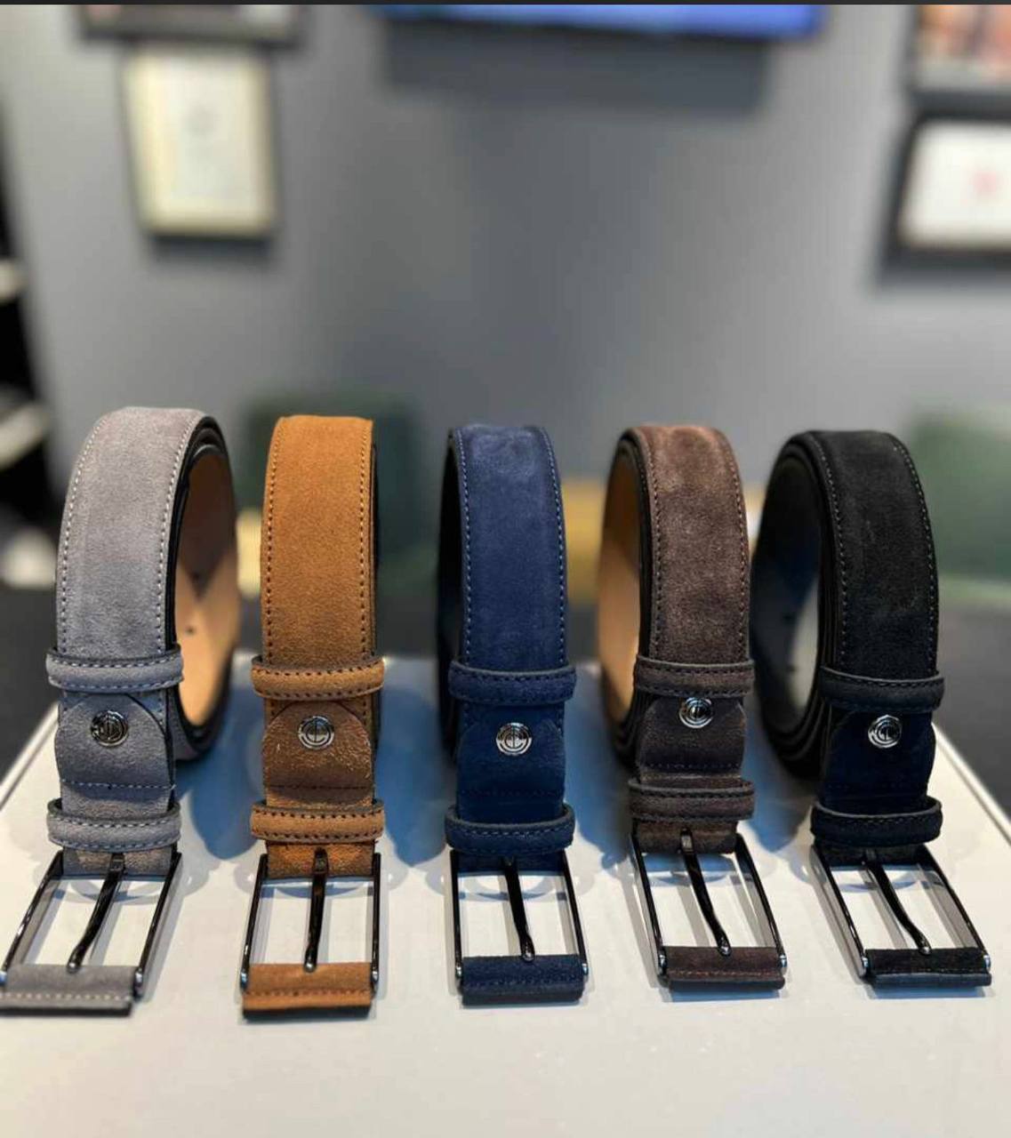 Men sewed fancy belts